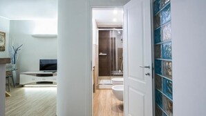 Apartment | Bathroom | Shower, free toiletries, hair dryer, bathrobes - CconfortHotels Il Guscio (Bitritto)