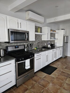 Fridge, microwave, oven, coffee/tea maker - 216A Lower Level, Deluxe Apartment (Jolly Harbour)
