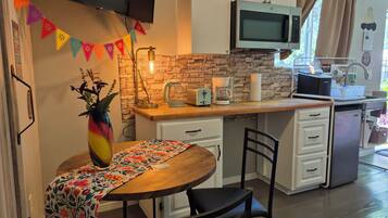 Fridge, microwave, coffee/tea maker, electric kettle