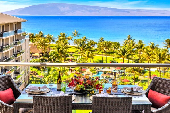 Tropical resort views with a peek of the ocean, perfect for relaxed mornings on the balcony.