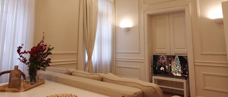 Deluxe Apartment, 2 Bathrooms | Living area | 40-inch Smart TV with cable channels