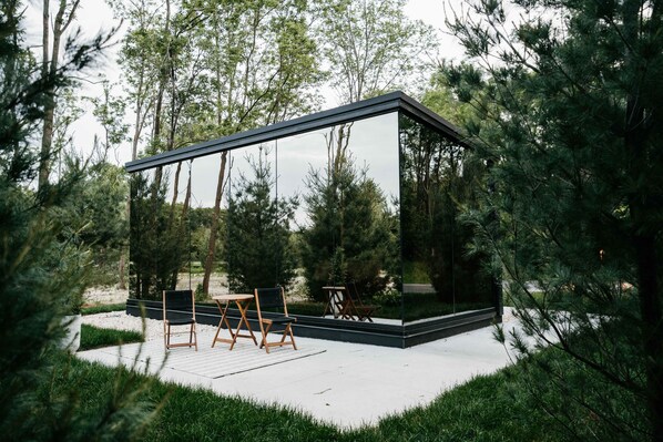 Terrace/patio - Luxurious mirrored cabin nestled on the Woods & Co Weddings + Events property for the ultimate getaway (Pepin)