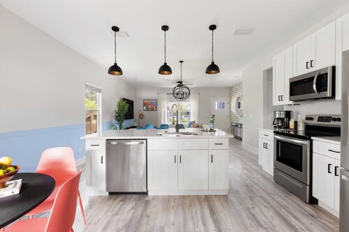 Playfully Designed Home + Hot Tub, Fire Pit & Game Room Blue Hour by Avantstay