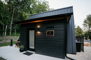Exterior detail - Birch A-frame cabin nestled on the Woods & Co Weddings + Events property (Pepin)