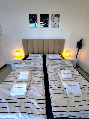 1 slaapkamer, een strijkplank/strijkijzer, gratis wifi, beddengoed