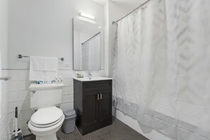 Hair dryer, towels, soap, shampoo