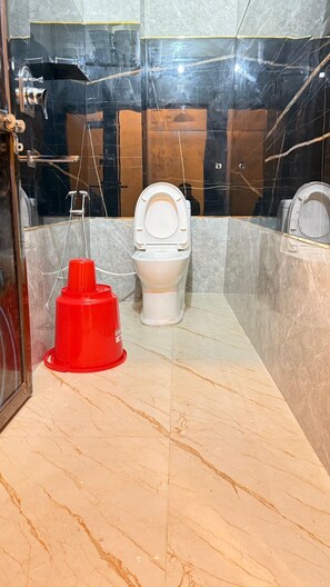 Classic Double Room | Bathroom | Slippers, soap, shampoo, toilet paper - Hotel Blu Heaven  (Gorakhpur)