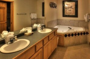 Jetted bath, hair dryer, towels, soap