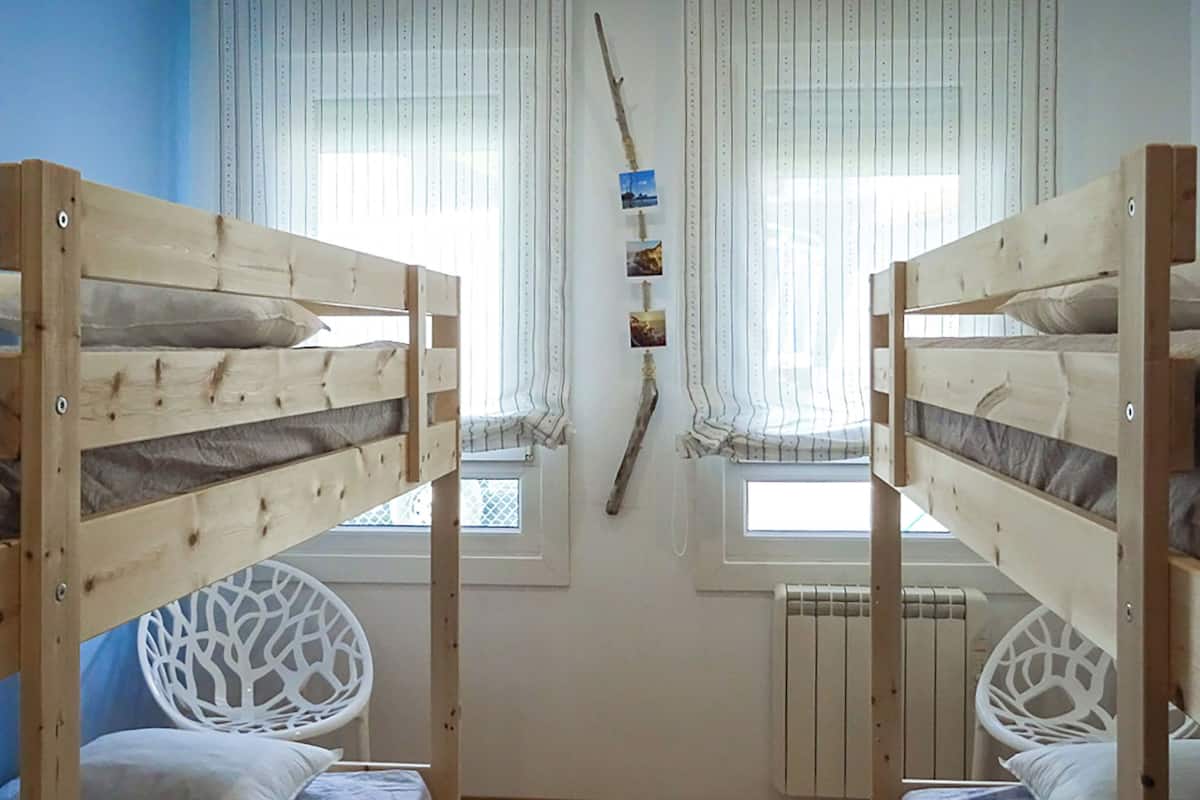 Shared Dormitory, Multiple Beds, Garden View | In-room safe, free WiFi, bed sheets