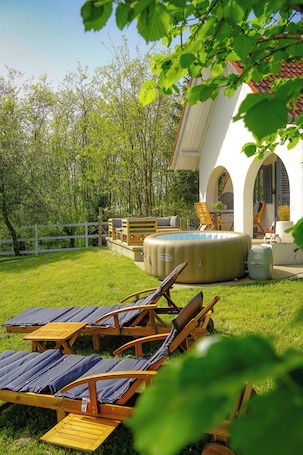 Terrace/patio. Charming luxurious cottage with a jacuzzi and AC on the Hungarian countryside.