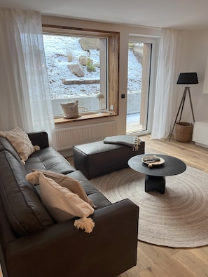 forest and meadow apartment | Living area | TV