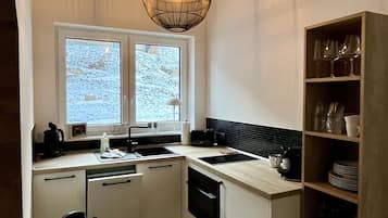Appartement, vue jardin | 2 chambres, coffres-forts dans les chambres, rideaux occultants