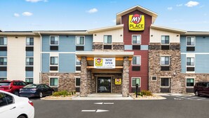 A multi-story hotel with a 'My Place' sign, indicating it is a Holiday Inn Express. - My Place Hotel Raleigh Garner NC (Garner)