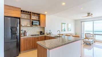 Apartment, Beach View | Private kitchen | Coffee/tea maker