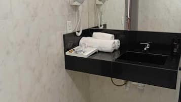 Separate bathtub and shower, hair dryer, bathrobes, slippers