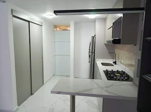 Private kitchen - Modern Family Apartment: Comfort, Space and Perfect Location. (Barranquilla)