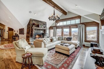 Experience comfort and elegance in our luxurious living room, featuring high ceilings, plush seating, and abundant natural light. Perfect for relaxing and entertaining.