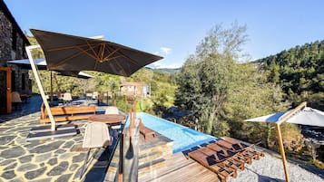 Outdoor pool, open 9:30 AM to 5:30 PM, pool umbrellas, sun loungers