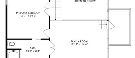 A floor plan of a hotel room with a primary bedroom, family room, and a bathroom.