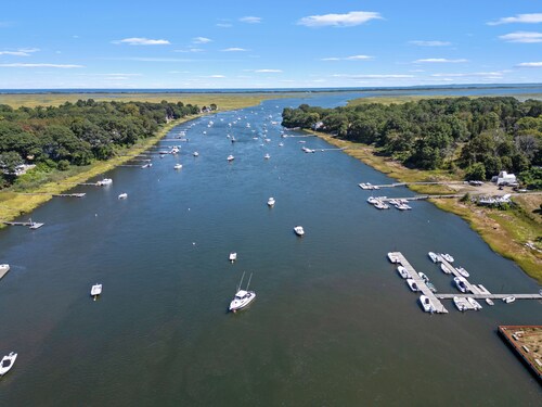 Cozy, open-concept, Parker River House. Waterfront, boat slip, pet-friendly!