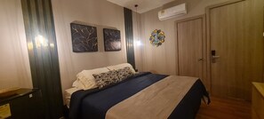 Chambre Deluxe | Fer et planche à repasser, Wi-Fi gratuit