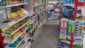 A store with shelves stocked with various products including snacks, beverages, and toiletries. - Kedaton Home Kostel (Surakarta)