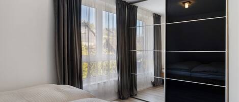 2 室のベッドルーム、WiFi (無料)、ベッドシーツ