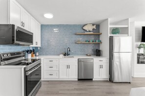 Fridge, microwave, oven, stovetop - Newly Renovated Beach Front Ocean View Condo Top of the Gulf 723 (Panama City Beach)