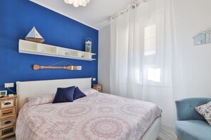 1 soverom og strykejern/-brett