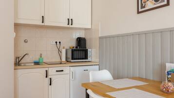 Fridge, microwave, toaster, high chair