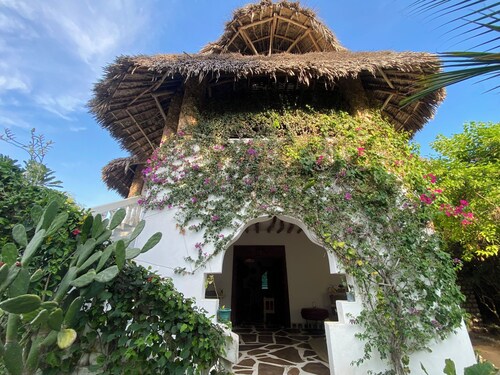 By the beach is the most awesome , cozy, stylish, tranquil, getaway villa. 