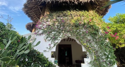 By the beach is the most awesome , cozy, stylish, tranquil, getaway villa.