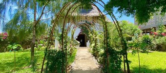 By the beach is the most awesome , cozy, stylish, tranquil, getaway villa. 