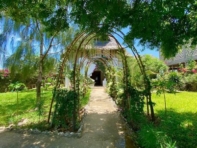 By the beach is the most awesome , cozy, stylish, tranquil, getaway villa. 