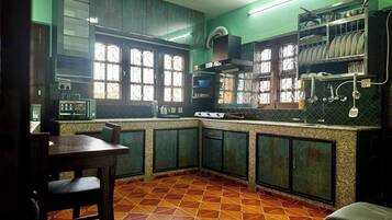 Fridge, microwave, cookware/dishes/utensils