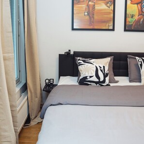 1 غرفة نوم ومكواة/لوح كي وخدمة الإنترنت وملاءات أسرّة