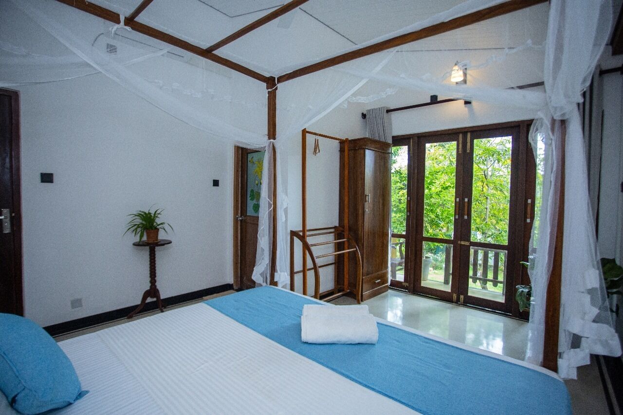 Deluxe Double Room, 1 King Bed, Balcony, Garden View | Desk, laptop workspace, free WiFi, bed sheets