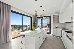 Fridge, microwave, oven, stovetop - Elysian Heights Luxury Villa by Nomads (Paphos)