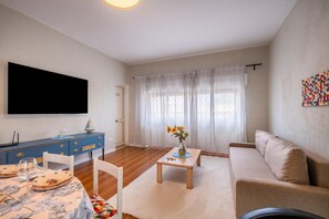 Villa, Patio, Sea View | Living area | TV