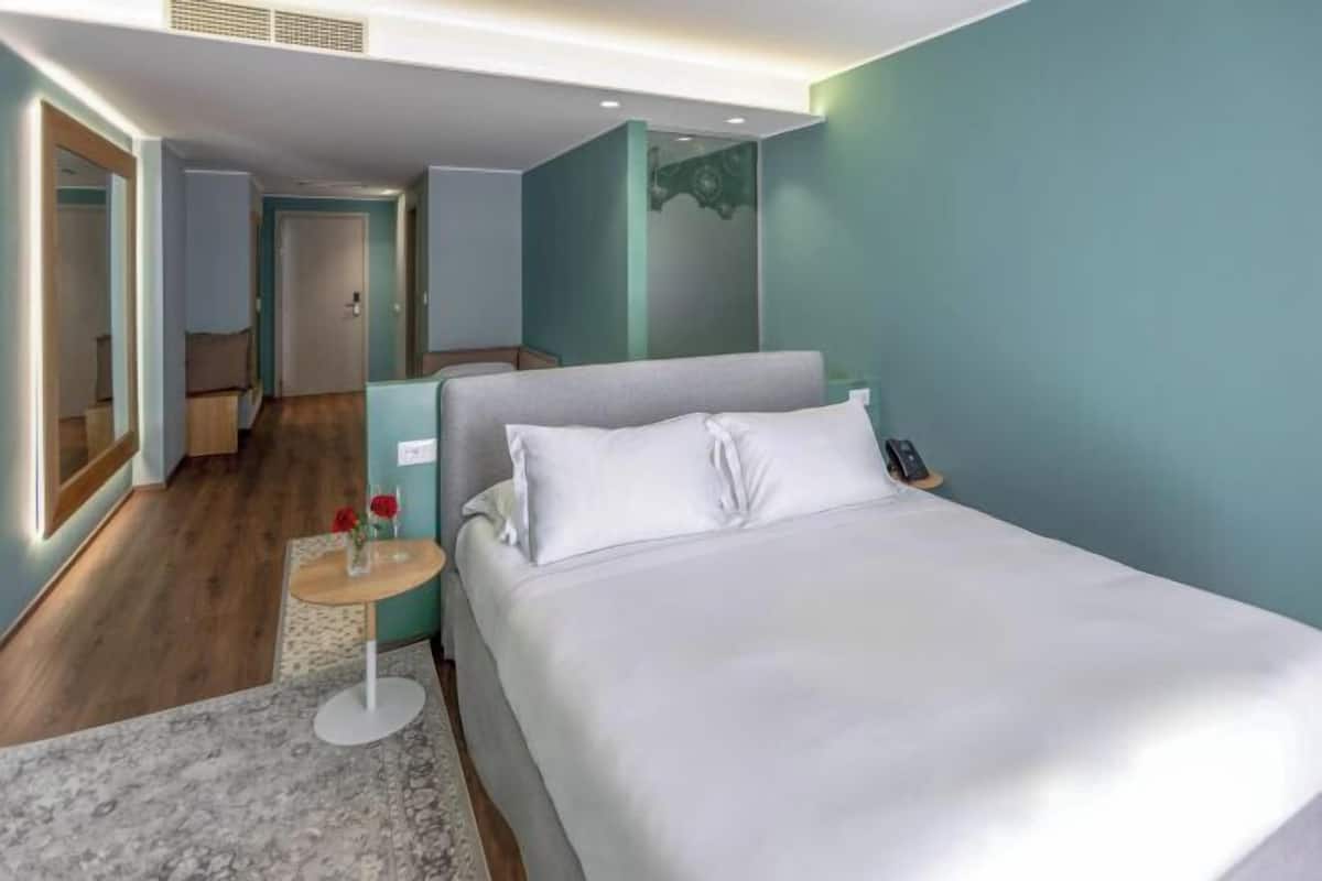 Ropa de cama de alta calidad y minibar