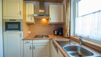 Réfrigérateur, micro-ondes, lave-vaisselle, cafetiÚre/bouilloire