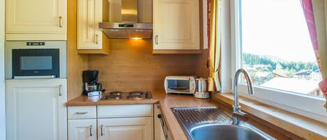 Fridge, microwave, dishwasher, coffee/tea maker