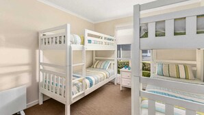 A child's bedroom with bunk beds, a dresser, and a window with blinds.