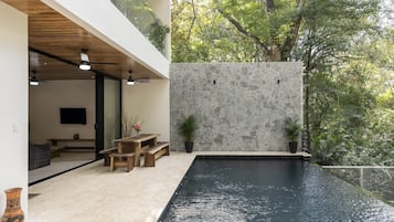Outdoor pool, pool umbrellas, sun loungers