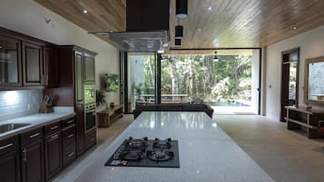 Luxury Apartment, 3 Bedrooms, Poolside | Private kitchen | Full-size fridge, microwave, oven, stovetop