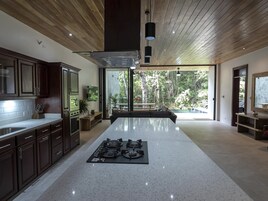 Luxury Apartment, 3 Bedrooms, Poolside | Private kitchen | Full-size fridge, microwave, oven, stovetop