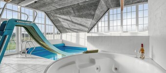 Family-friendly holiday home with pool, located close to the North Sea in Vrist.