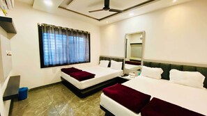 Deluxe Quadruple Room, City View | Soundproofing, free WiFi