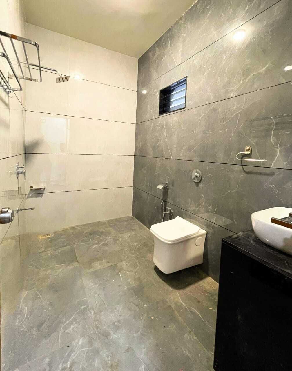 Deluxe kamer, uitzicht op tuin | Badkamer | Zeep, shampoo, toiletpapier