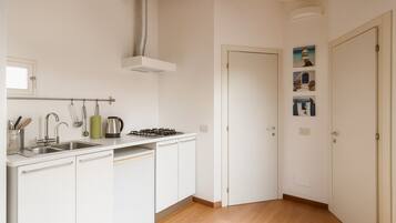 Family Apartment, City View | Private kitchen | Cookware/dishes/utensils